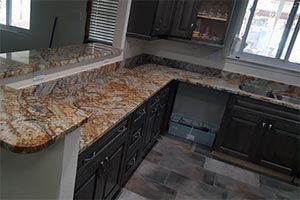 African Canyon Countertops & Tahoe Ash Cabinets